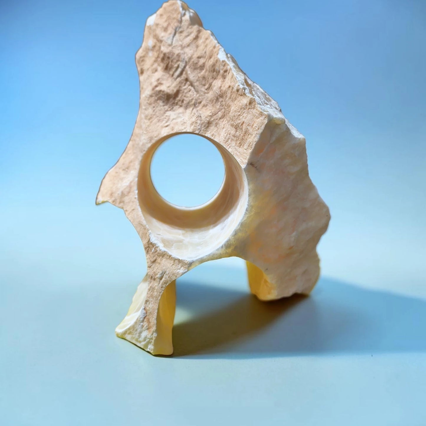 A piece of natural honey-white onyx for aquarium decorating.