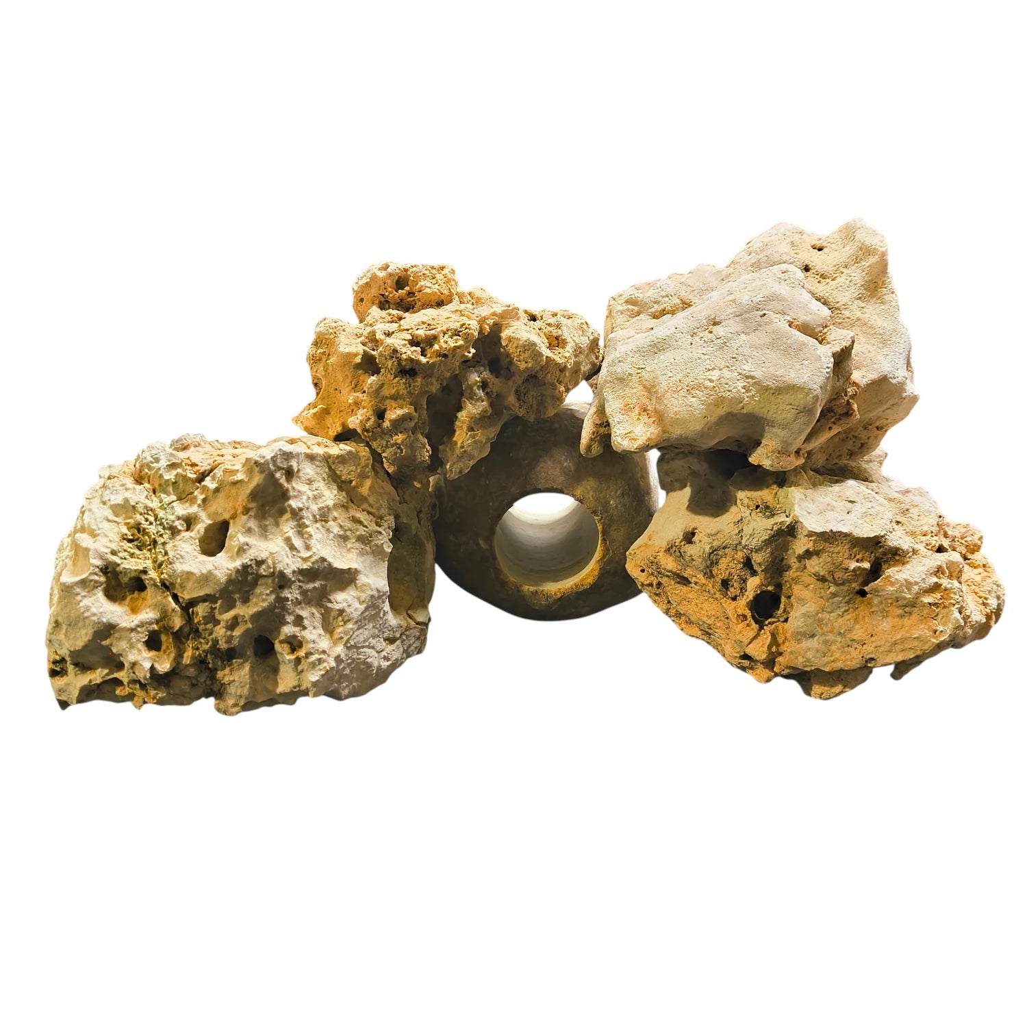 A group of Texas Holey Rocks stacked in a pile on a white background.